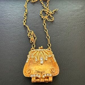 Elegant Golden Chain and Bag-Shaped Locket